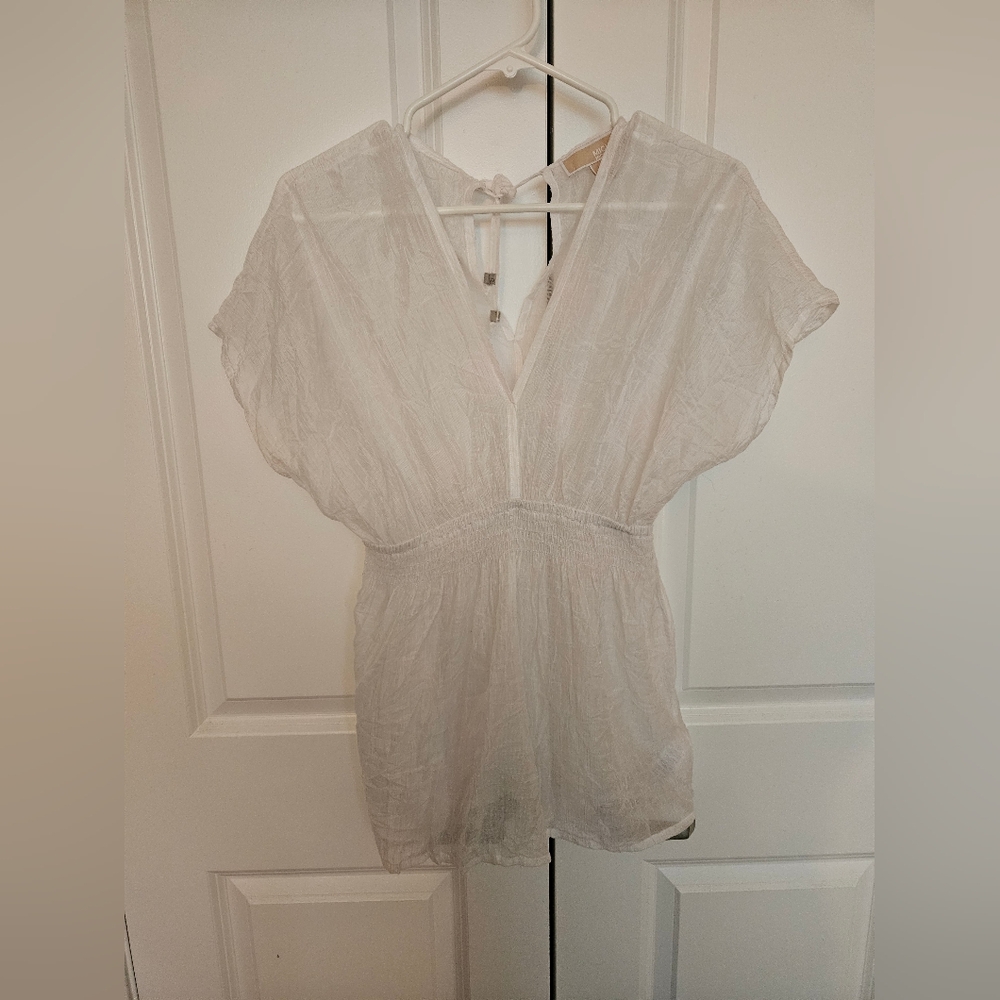 Michael Kores Cover Up